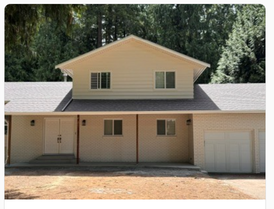 After: same Langley home with new architectural asphalt shingle roof installed by Roofking